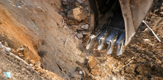 image of bulldozer working on demolition and road construction in duluth minnesota by aplus contractors